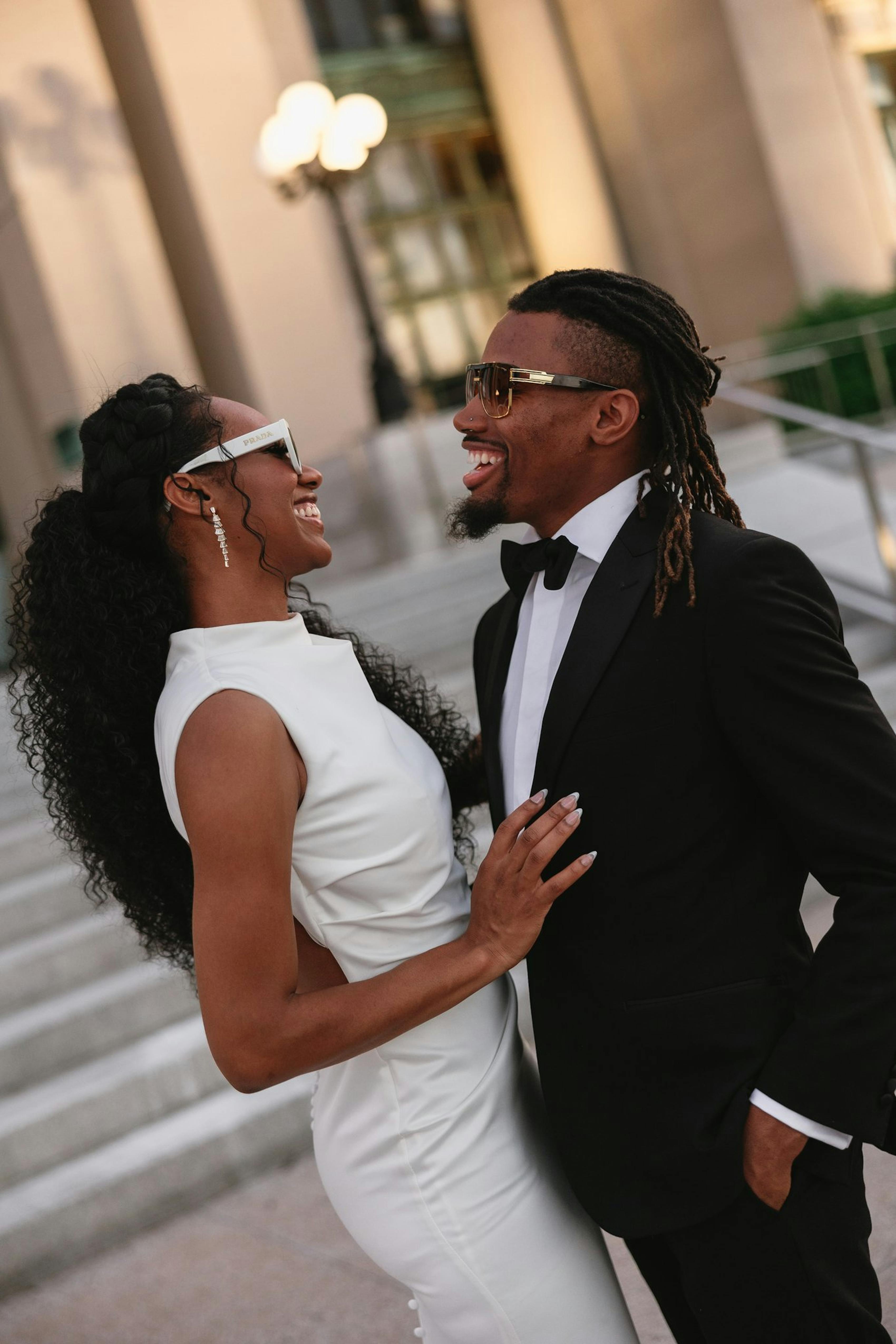 bride and groom matching sunglasses