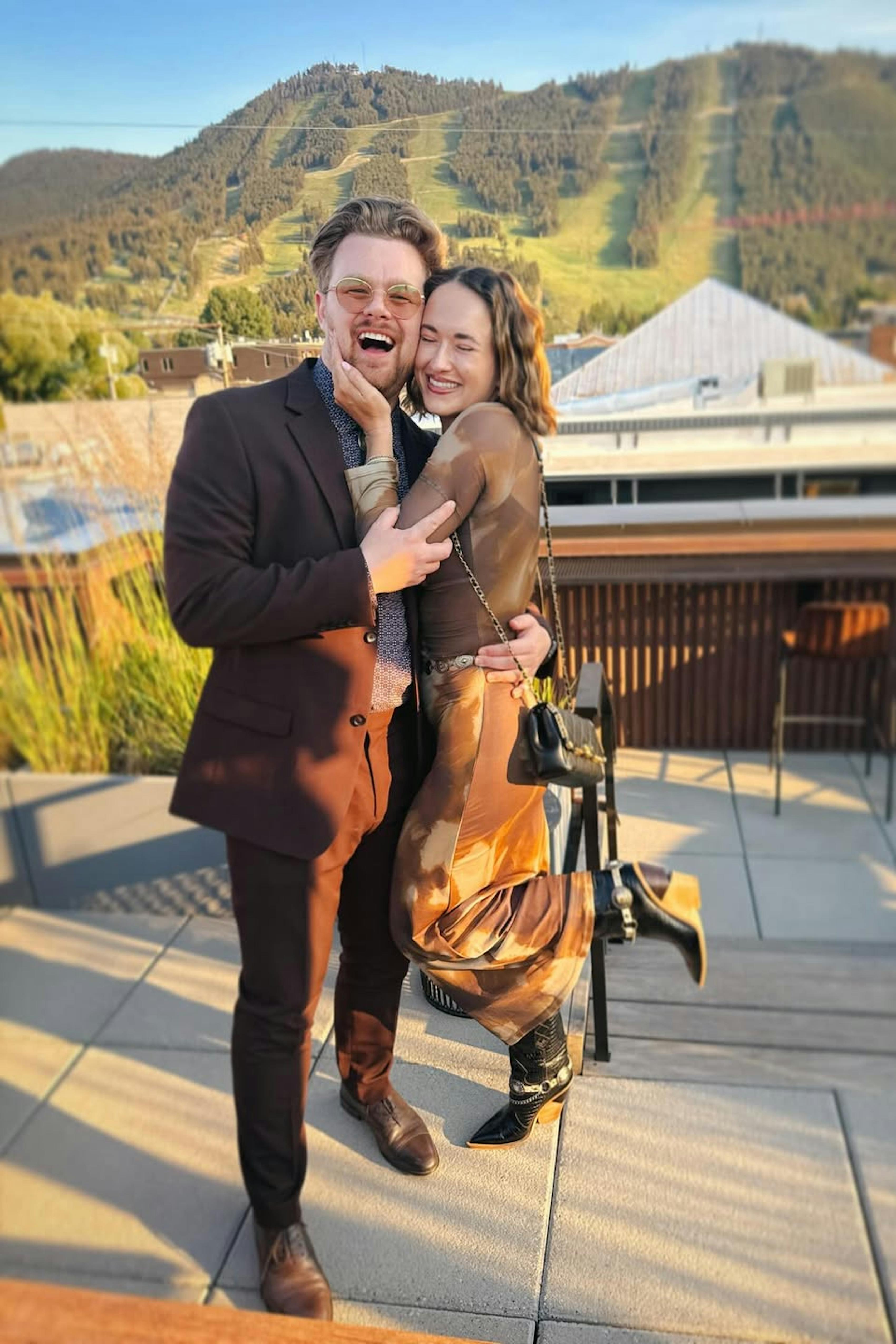 Dark brown suit for mountain wedding guest outfit with a date