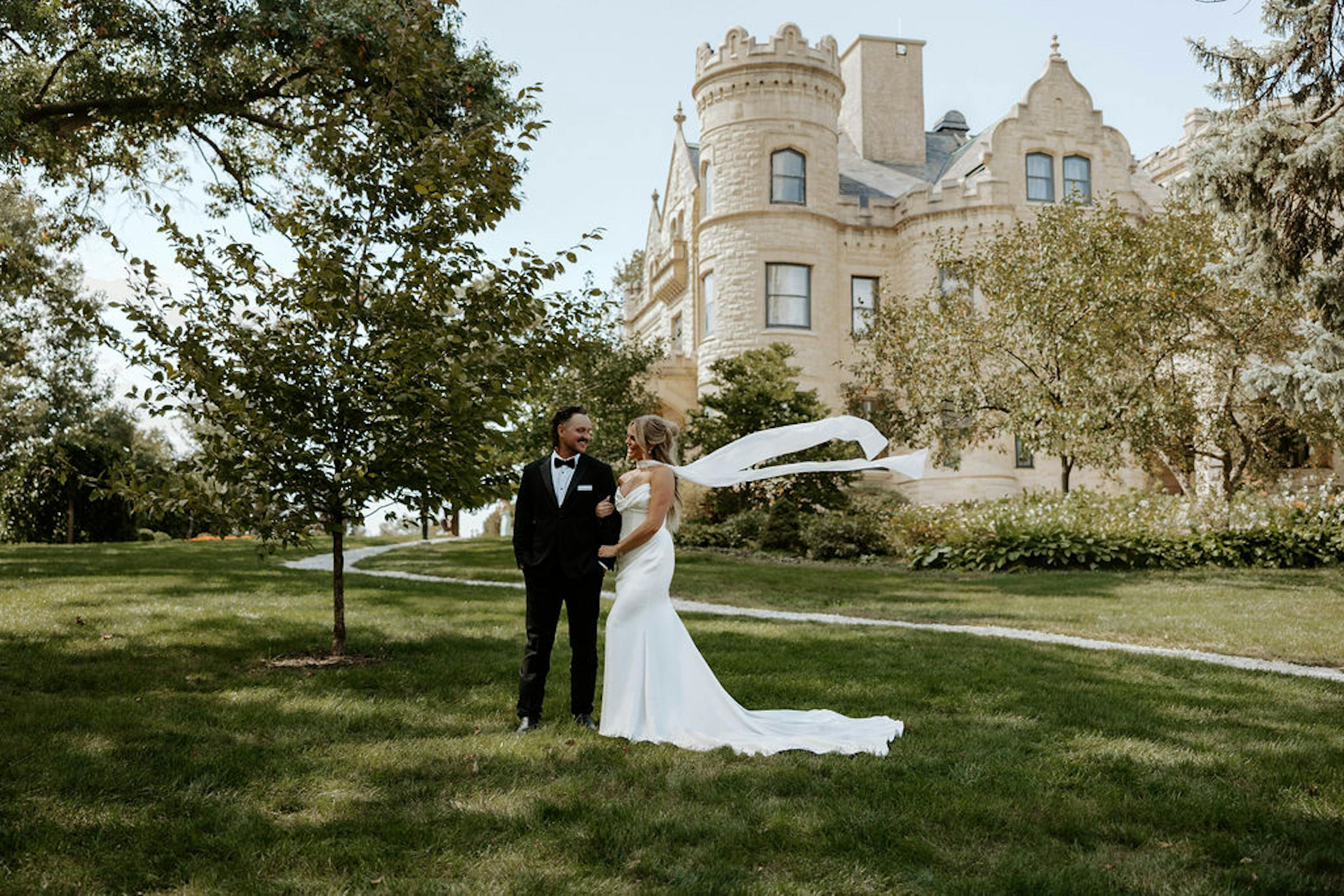 bride and groom first look at castle venue