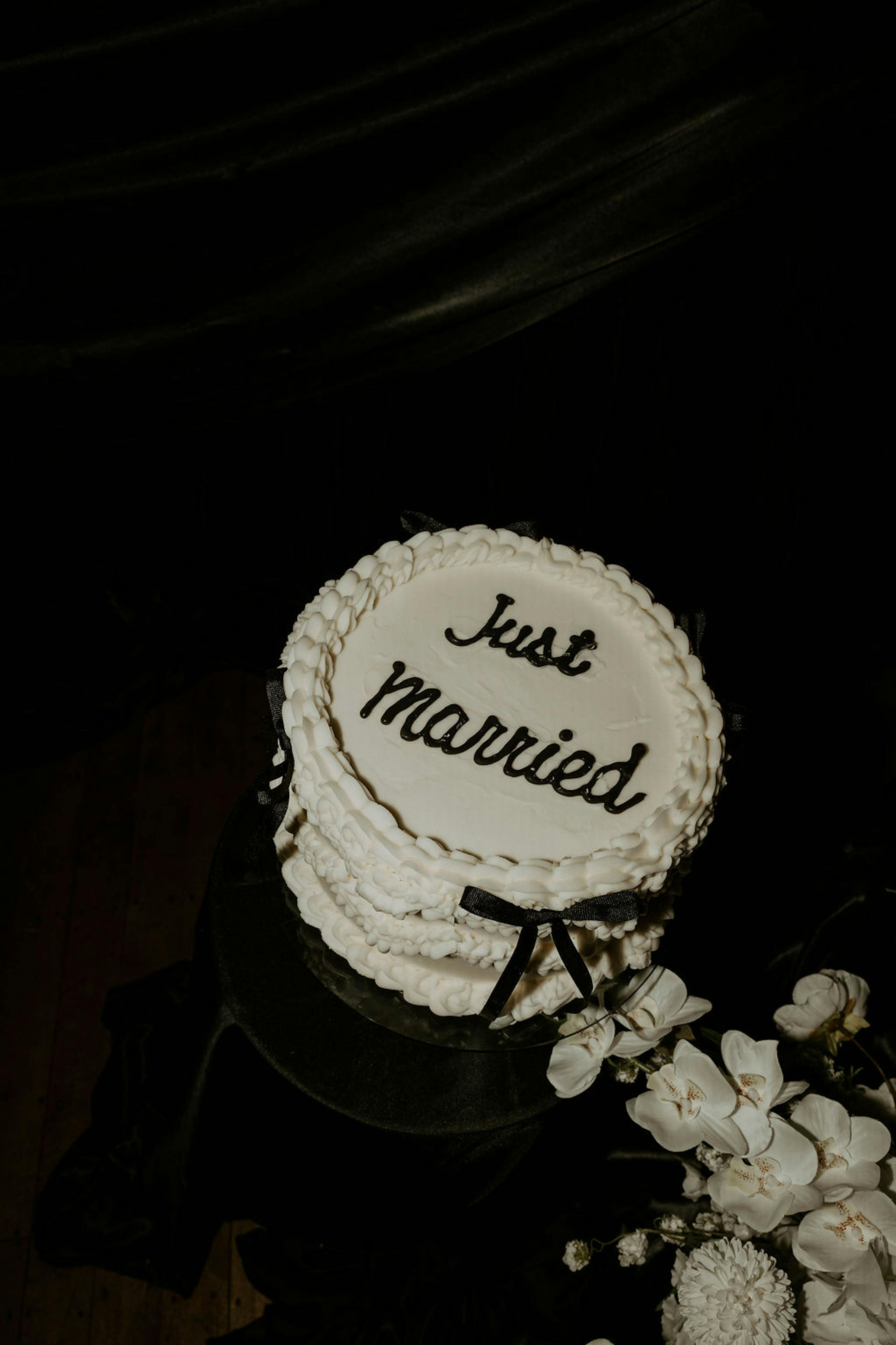 trending just married wedding cake