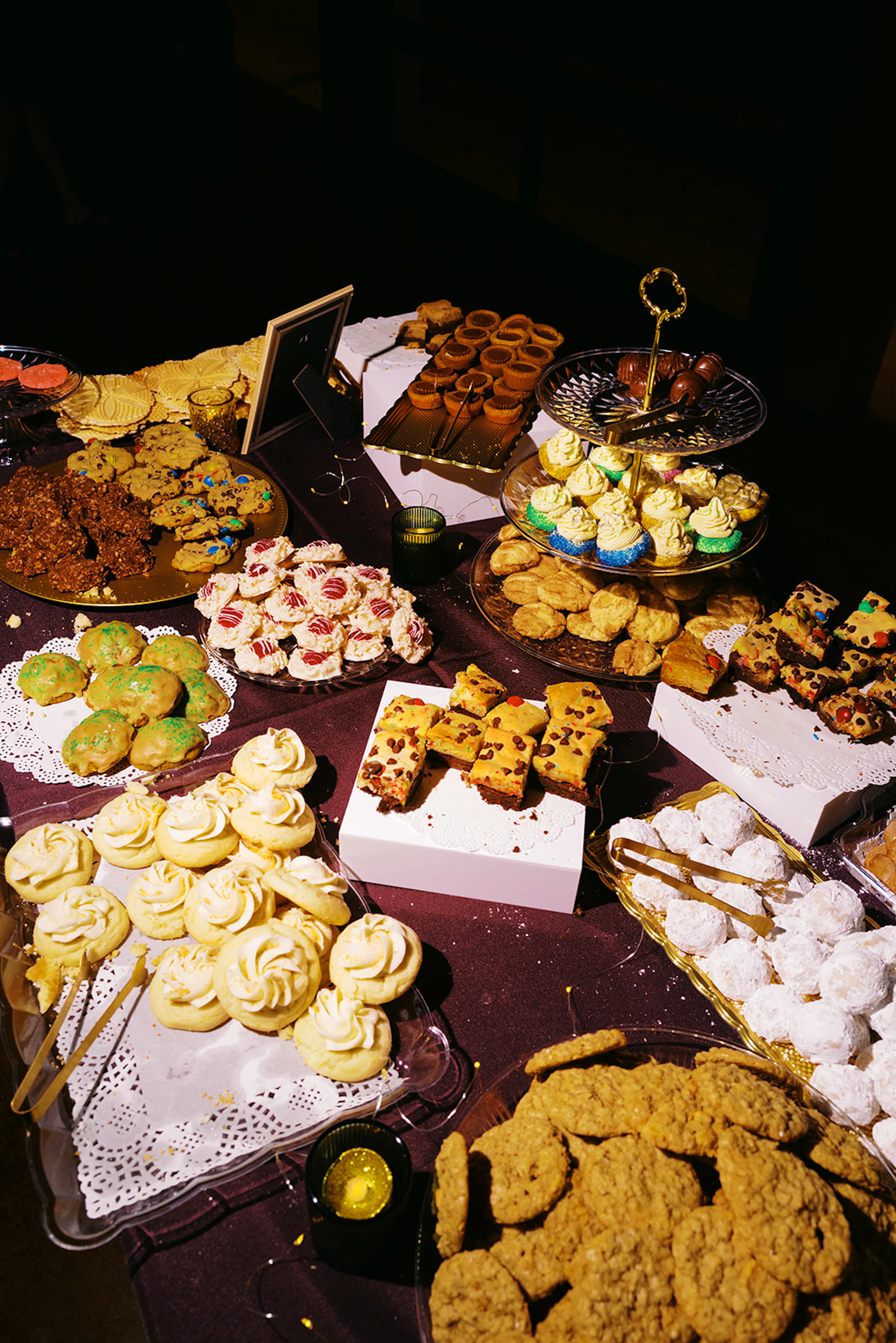 Wedding dessert grazing table with cookies, bars, and tarts