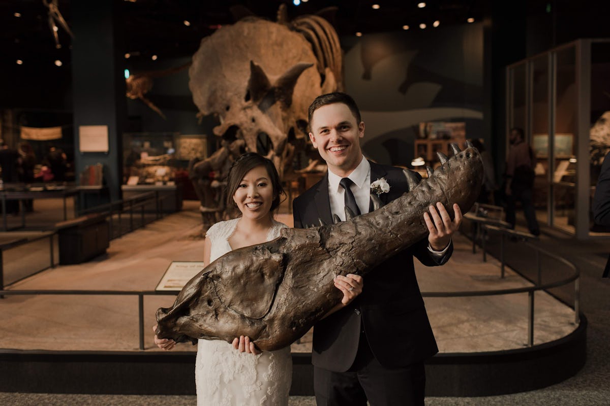 Alternative couple at wedding reception at natural history museum wedding venue.