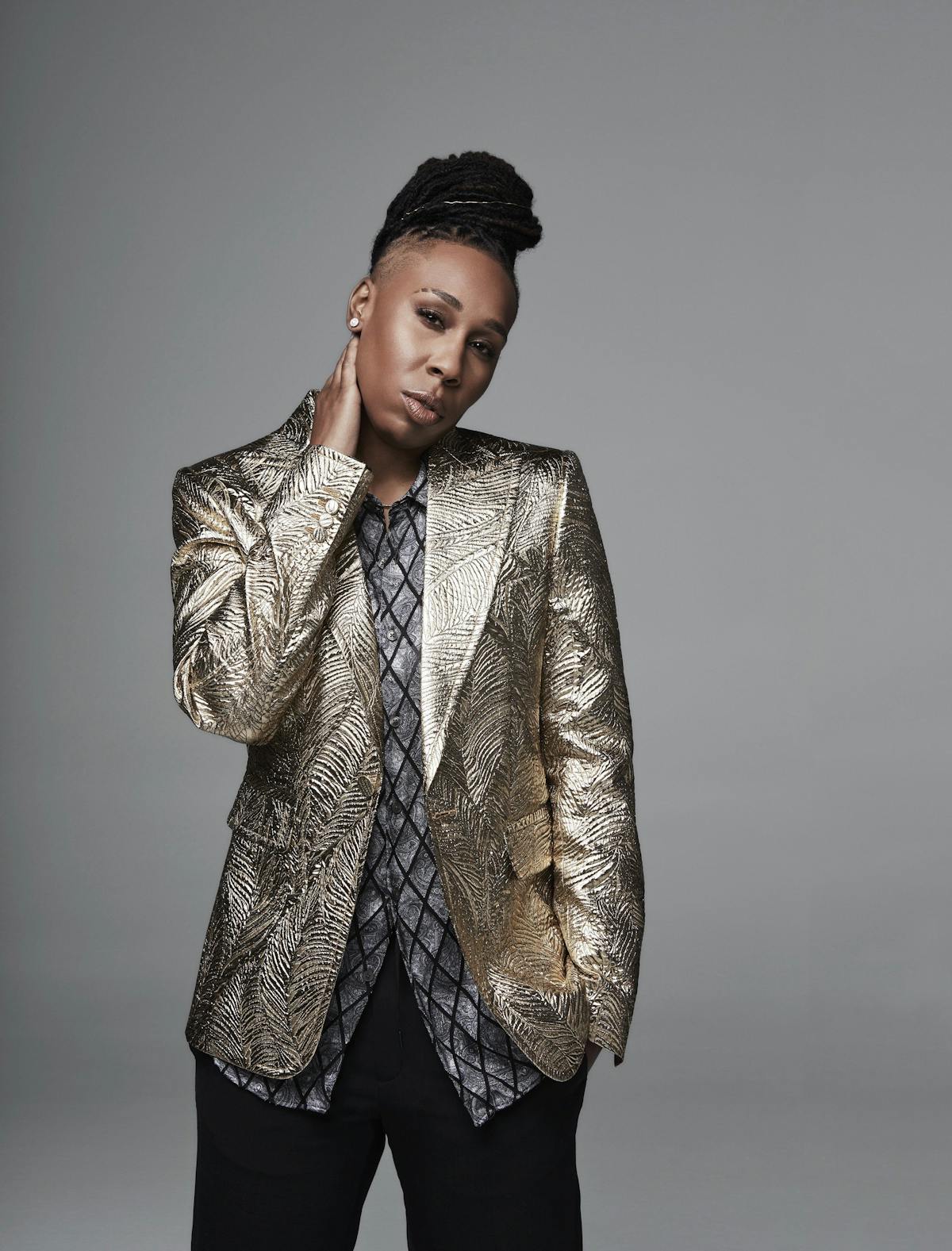 Lena Waithe wearing a metallic blazer.