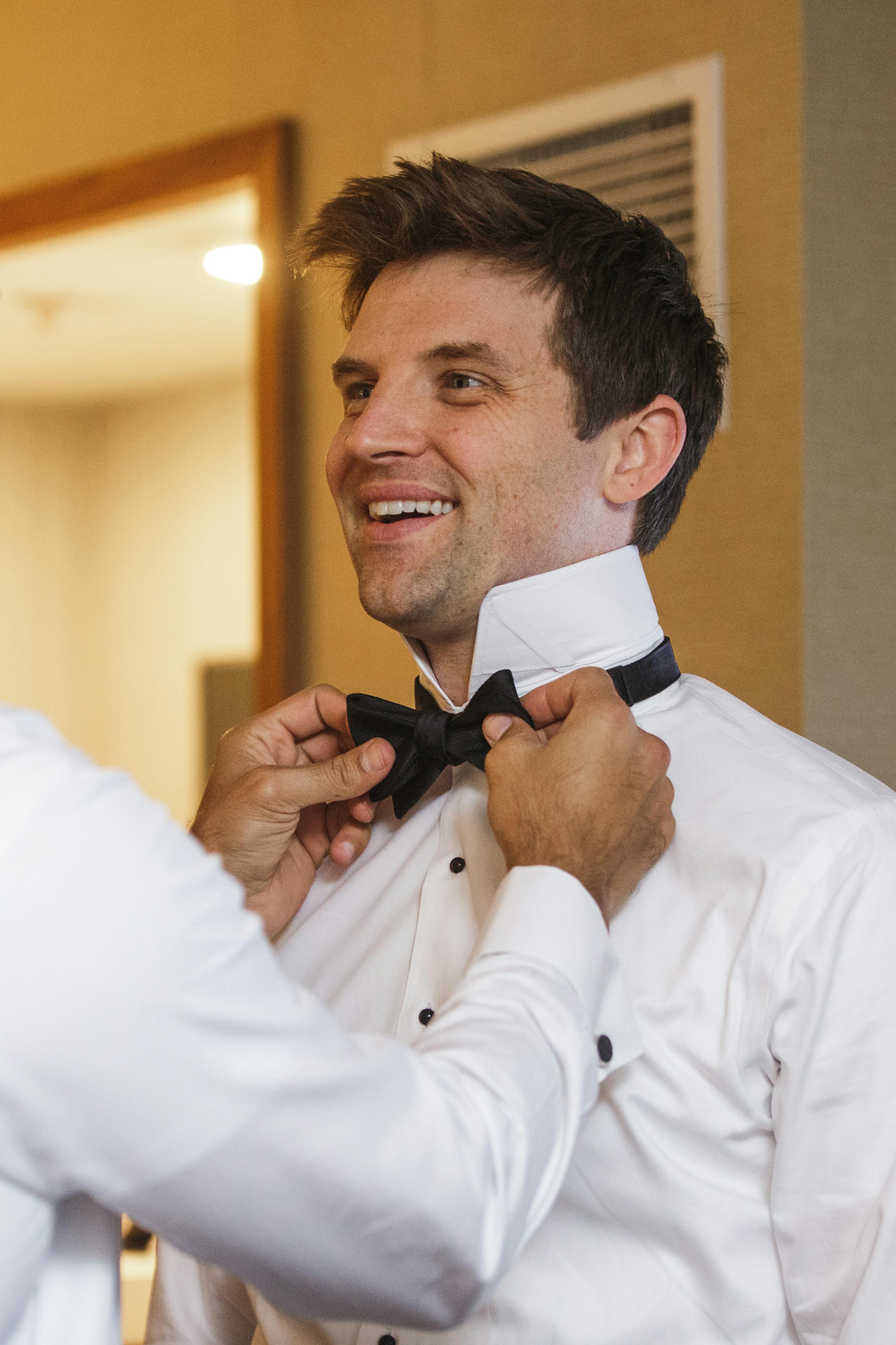 How to decide between a suit vs tuxedo for your wedding