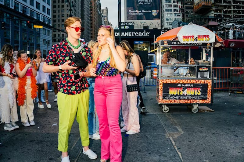 Bright colors, suit pants, sequins, fruit prints, and sunglasses for Love on Tour concert outfit.