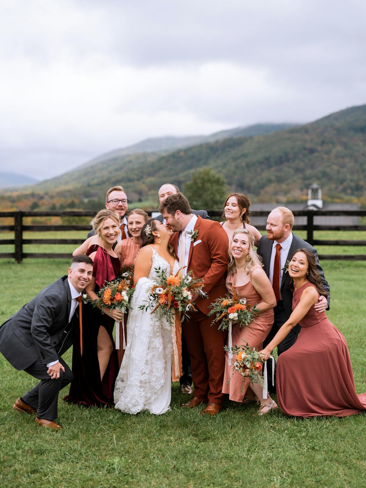 orange mix matched wedding party 