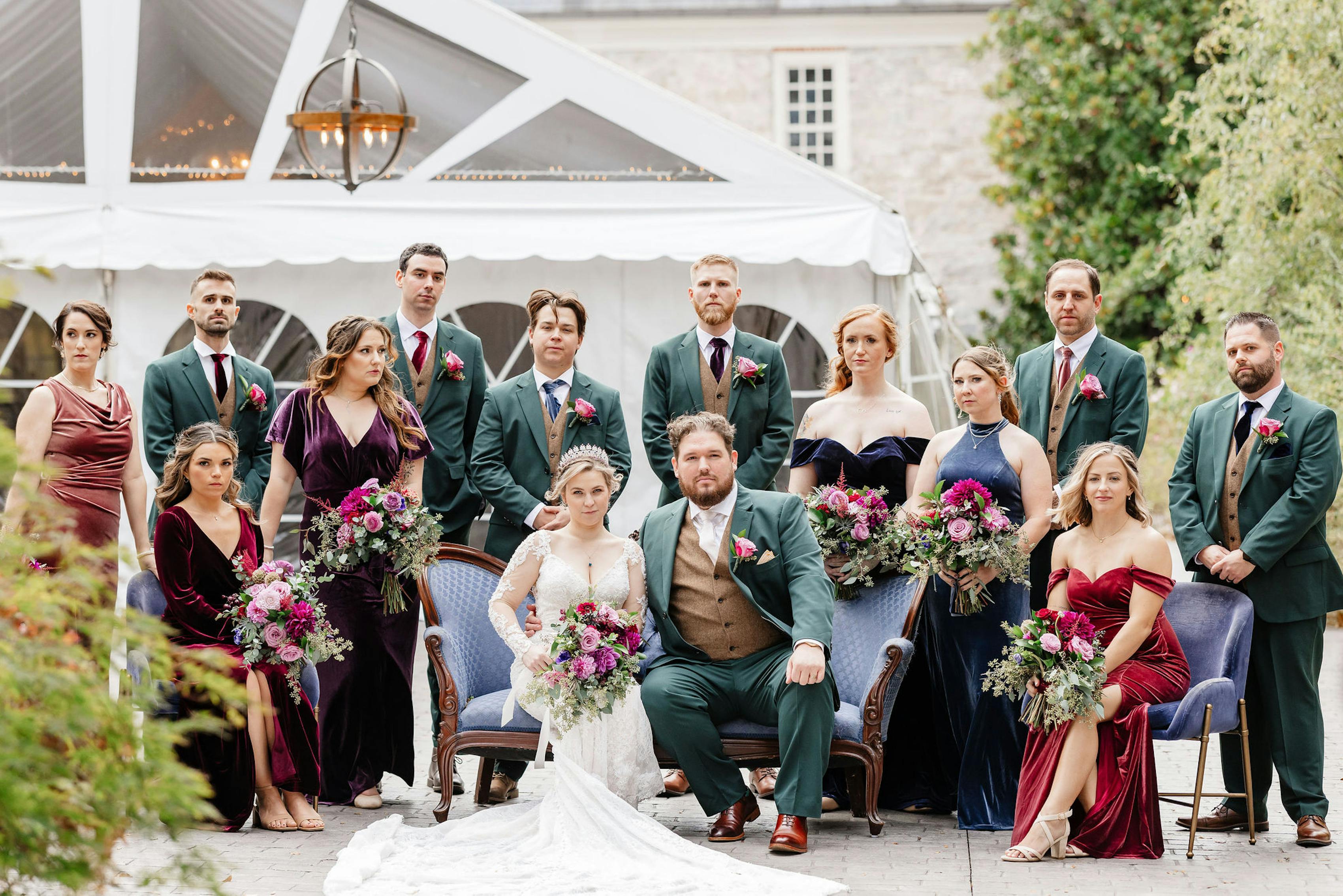 Jewel tone wedding party posing for fall wedding.