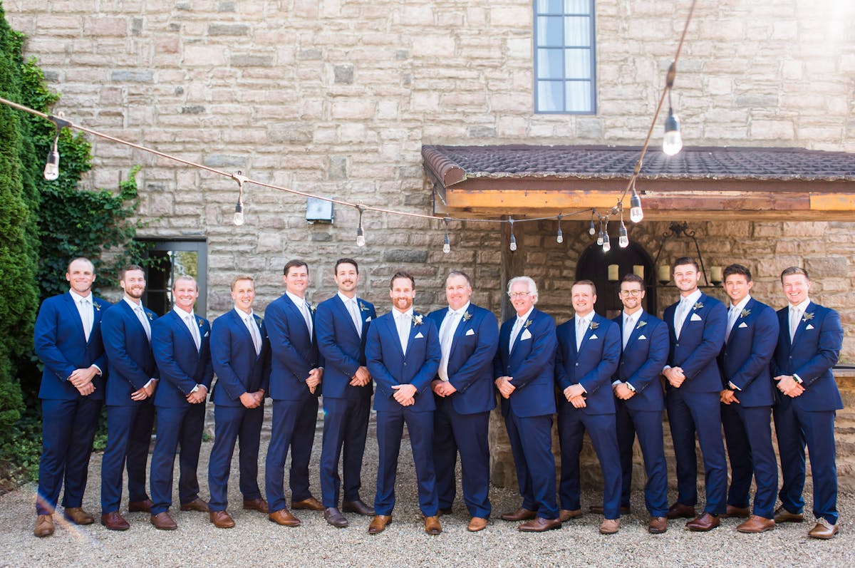 Groomsmen in bright blue wedding suits for men