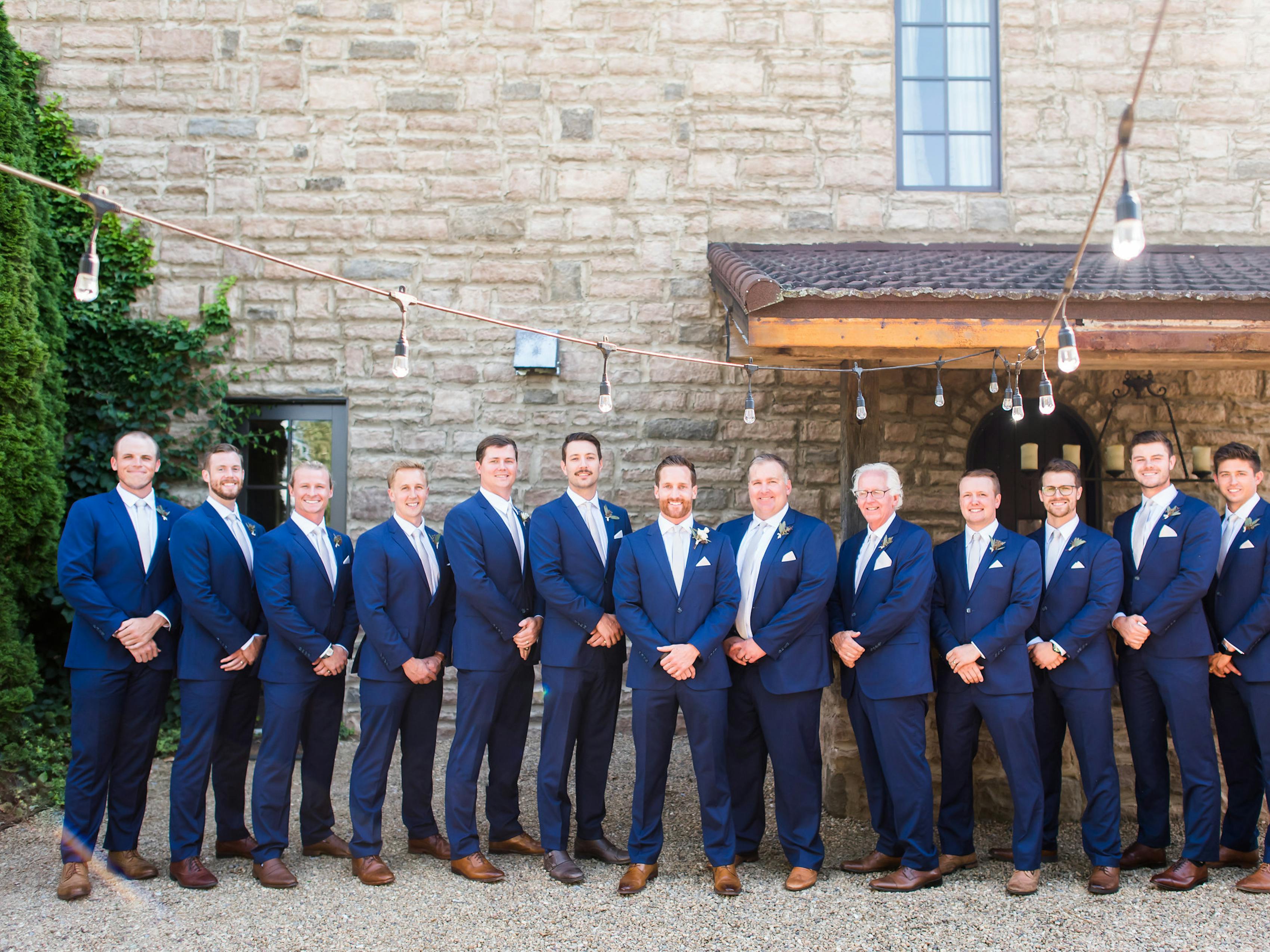 Groomsmen in bright blue wedding suits for men