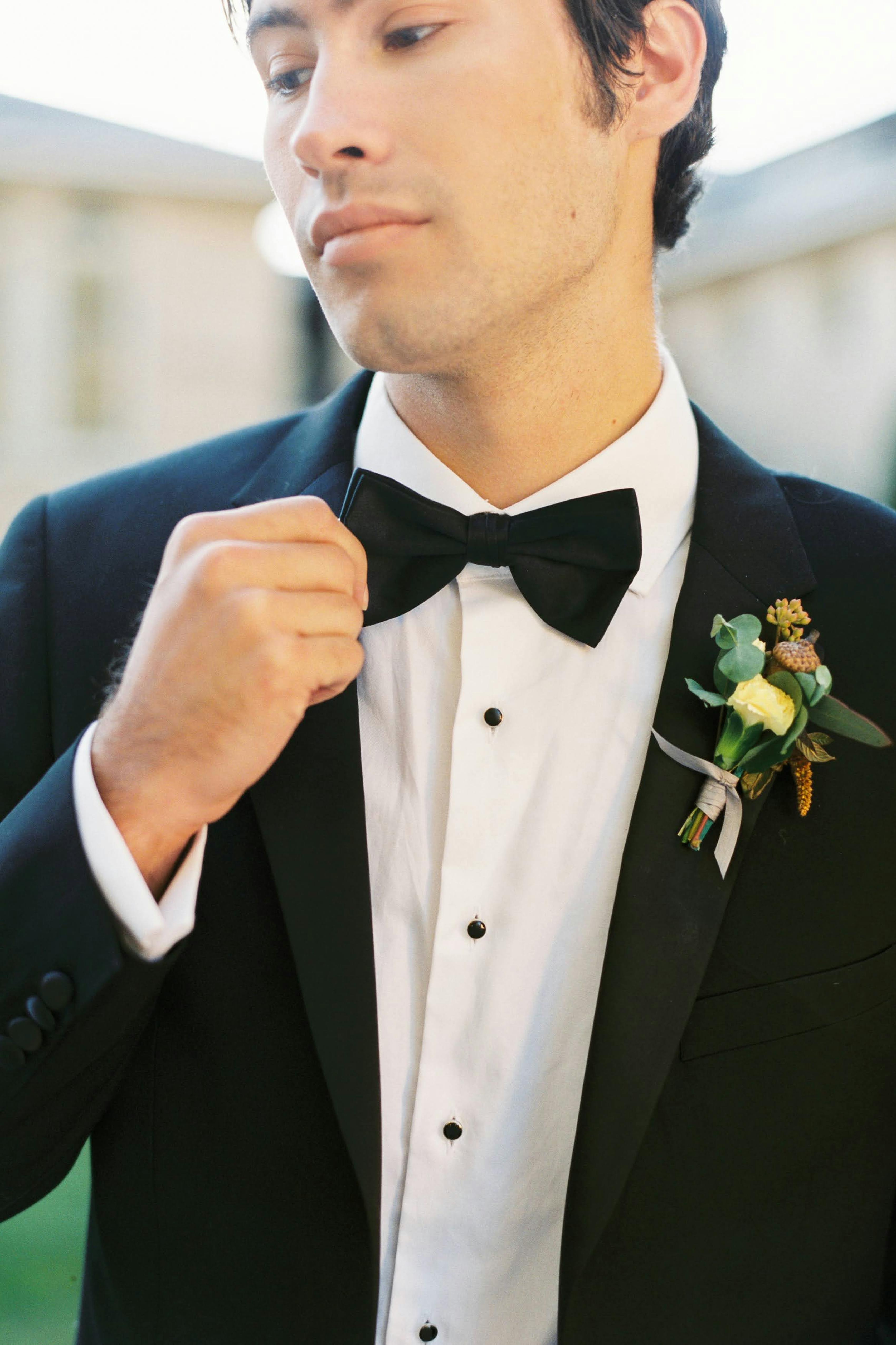How to decide between a suit vs tuxedo for your wedding