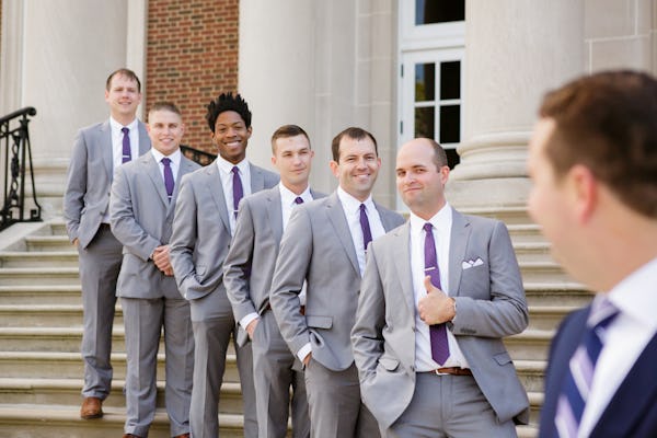 Groomsmen in grey wedding suits