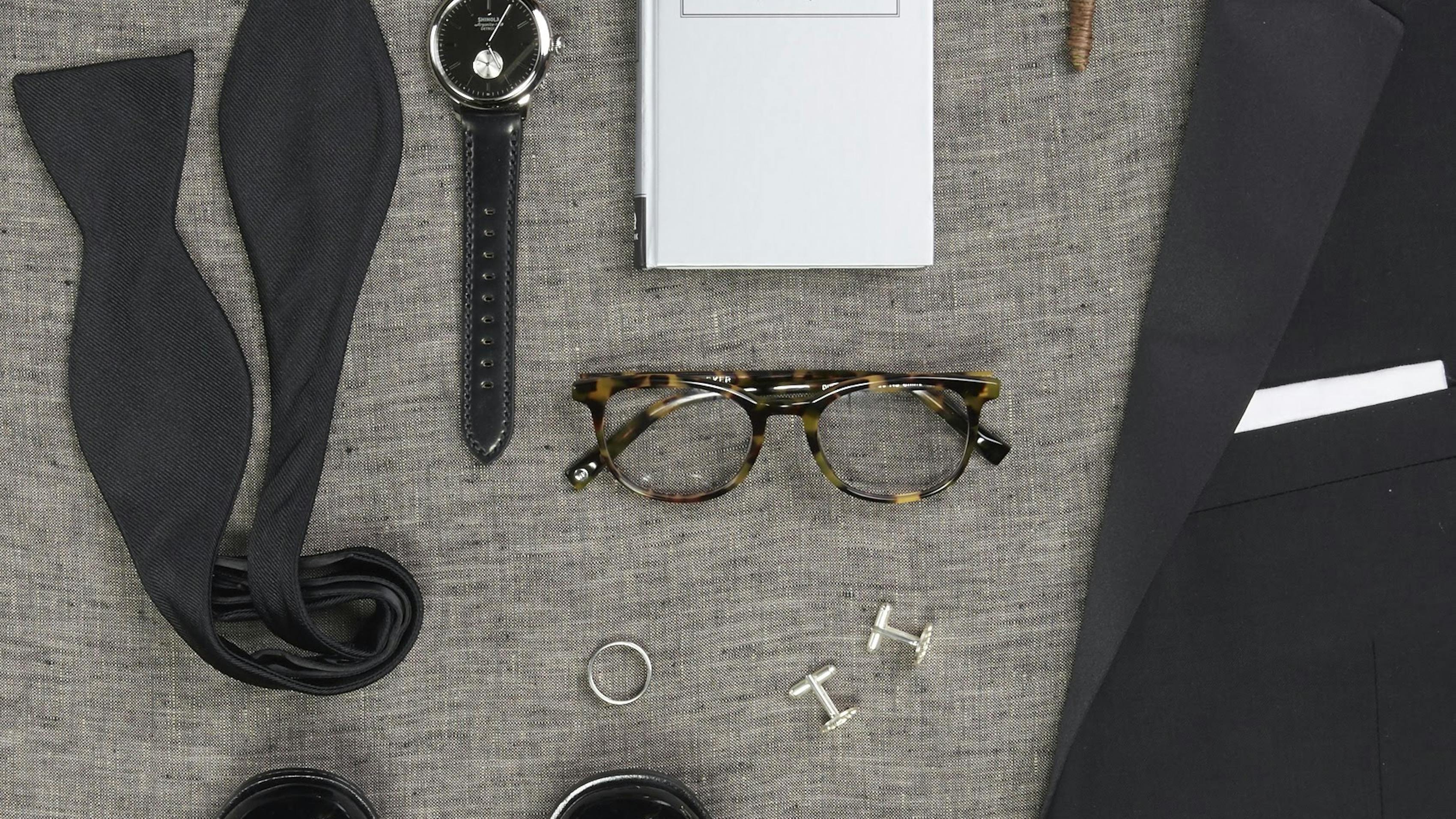 Wedding Planning Checklist for grooms to get groomsmen suited up in wedding suits for men.