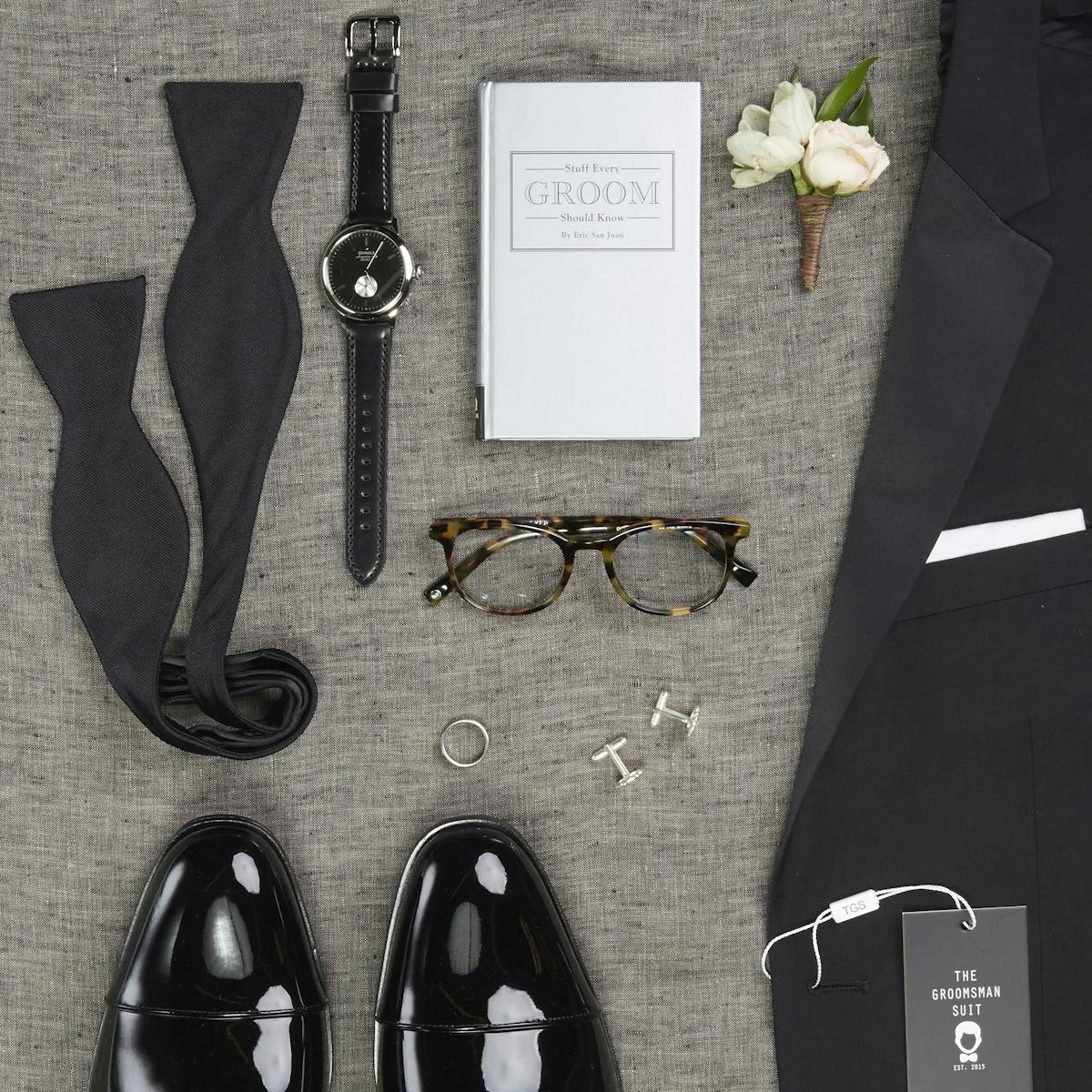 Wedding Planning Checklist for grooms to get groomsmen suited up in wedding suits for men.