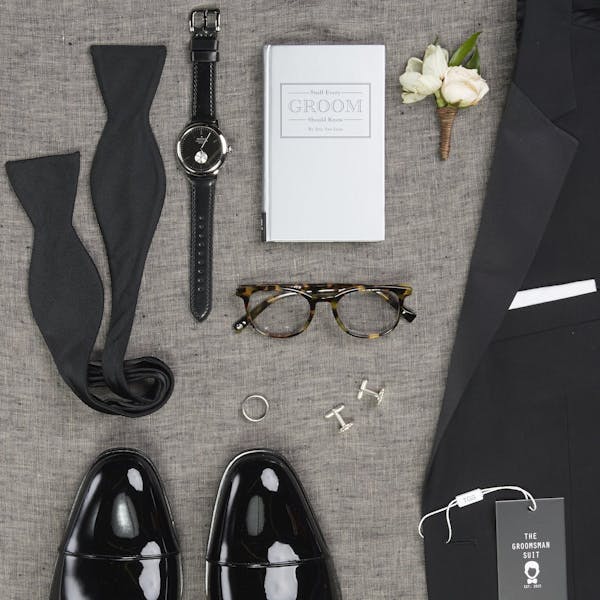 Wedding Planning Checklist for grooms to get groomsmen suited up in wedding suits for men.