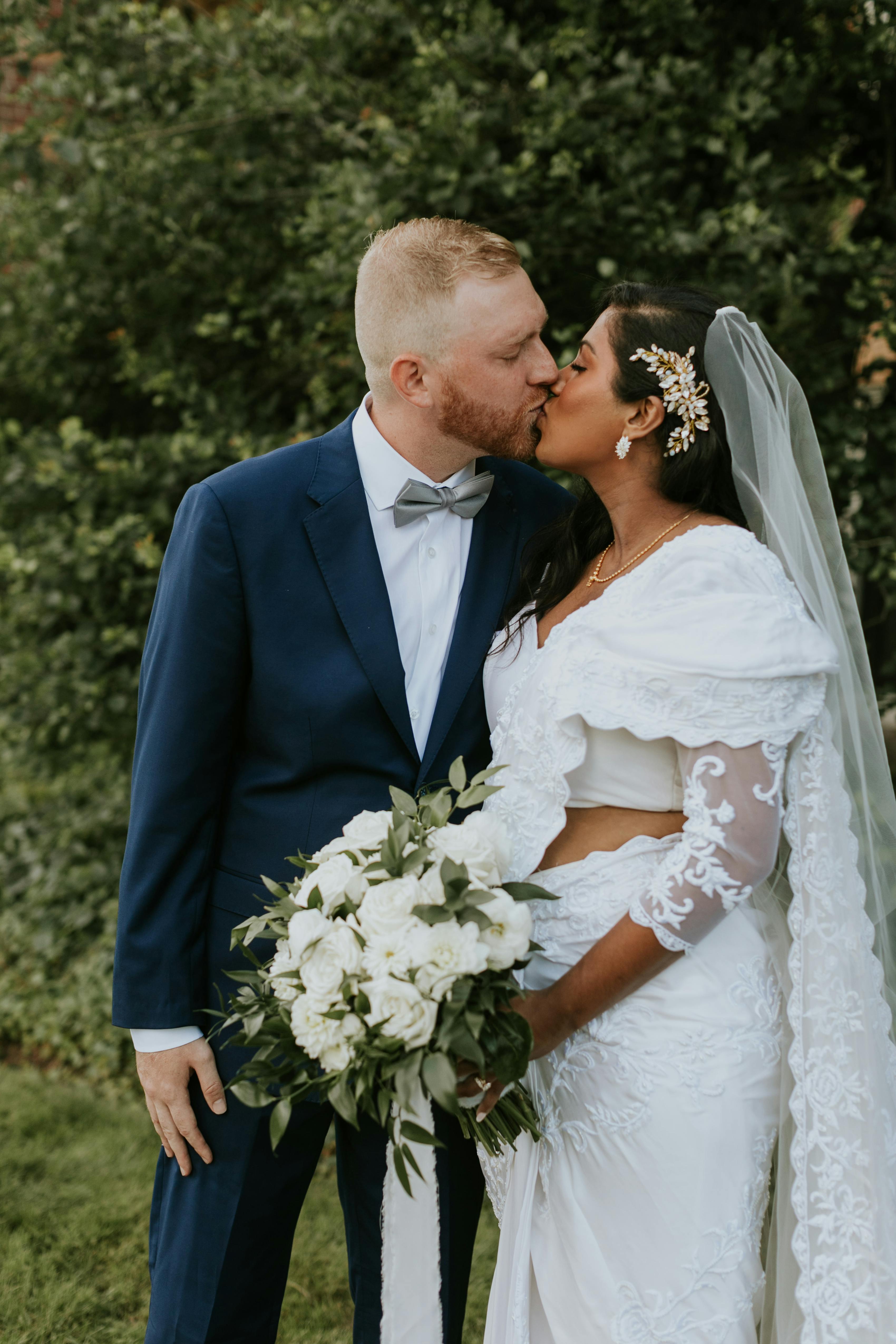 Bride Kawinthi of Events by Kawinthi and Groom in Navy Suit by Suit Shop