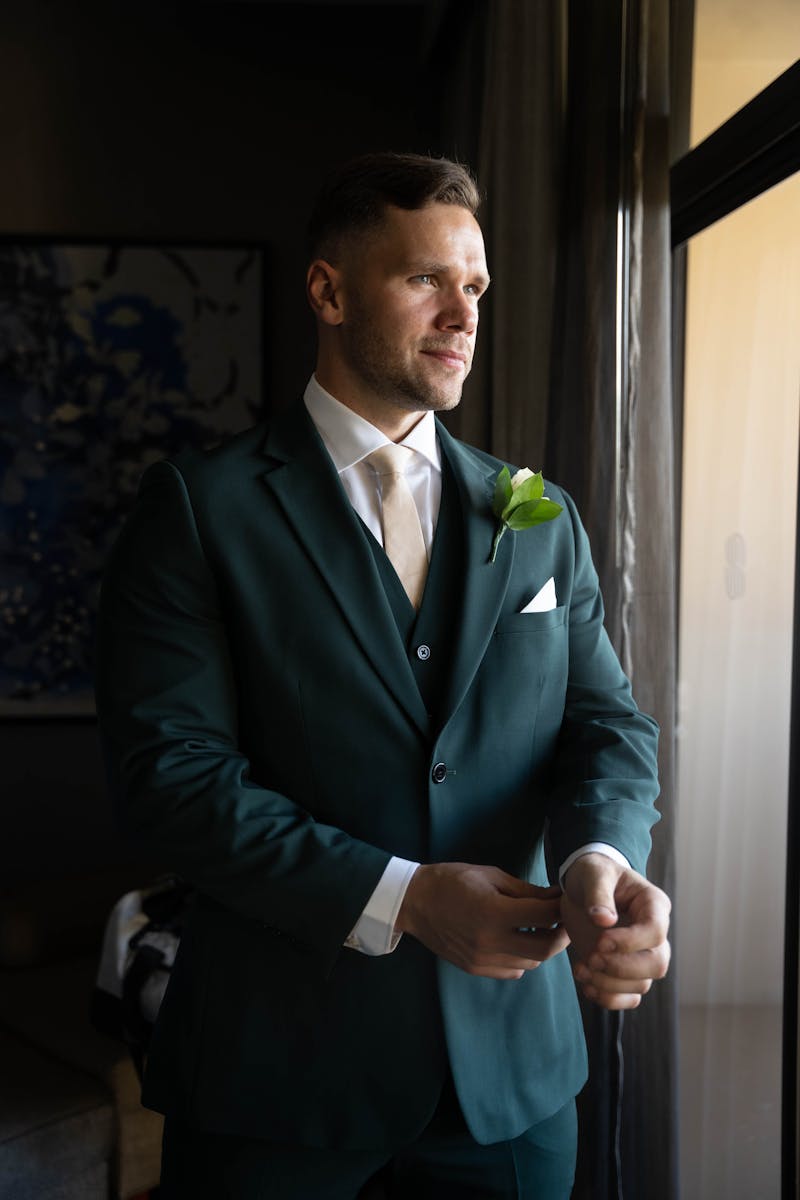 Champagne and dark green wedding suit colors.