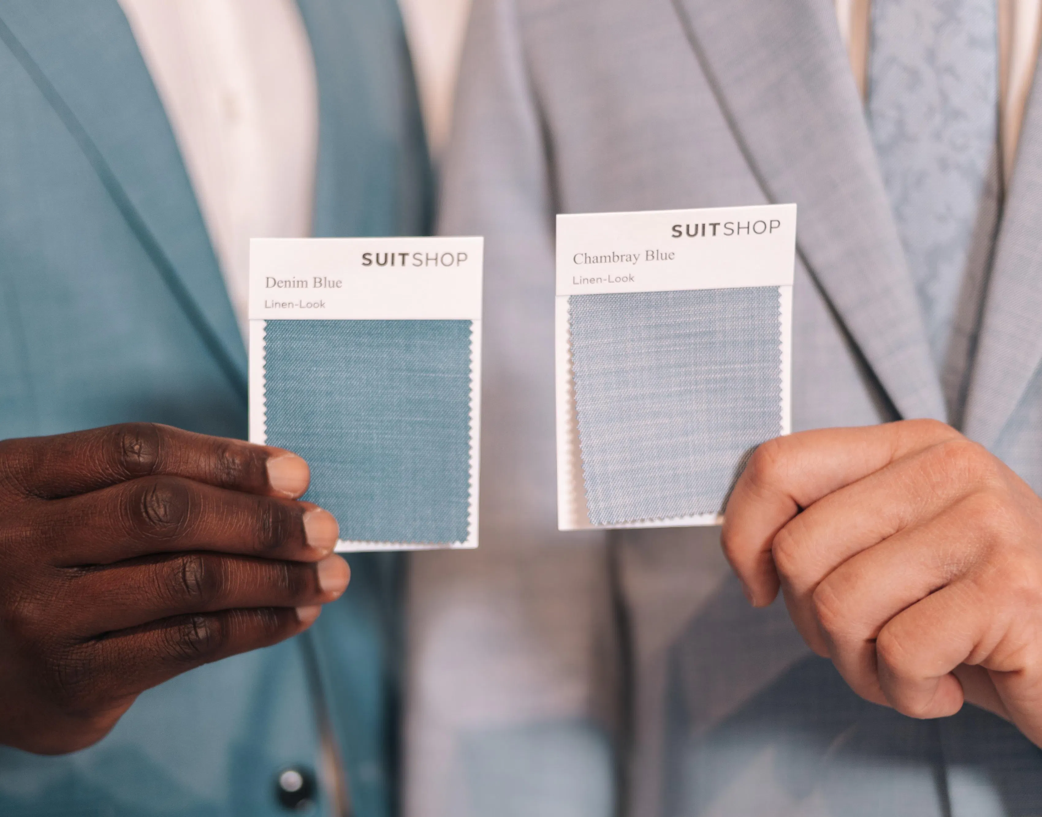 SUITSHOP blue suit fabric swatches displaying linen-look materials for custom suits.