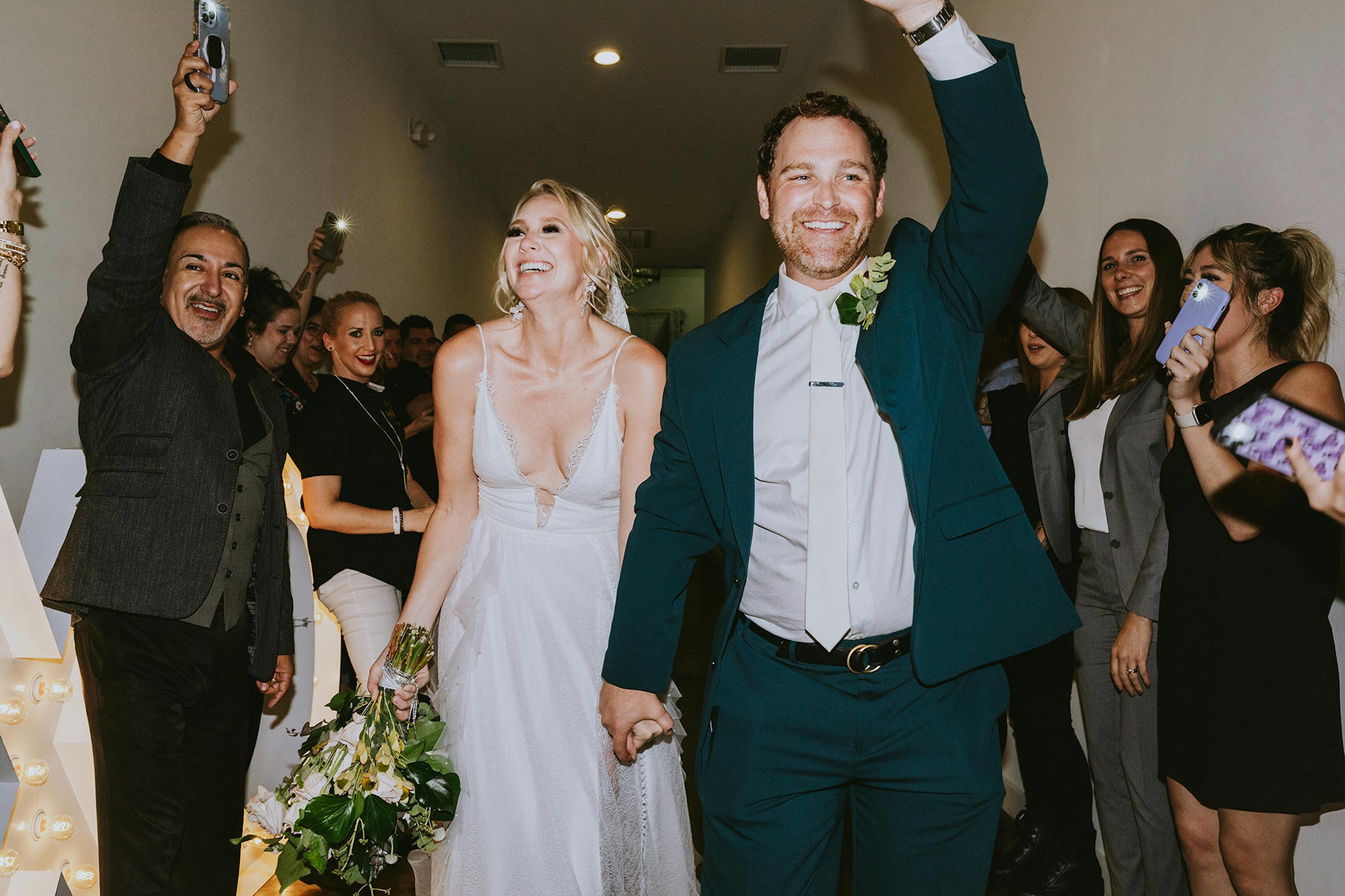 Wedding exit photo of teal color scheme wedding 