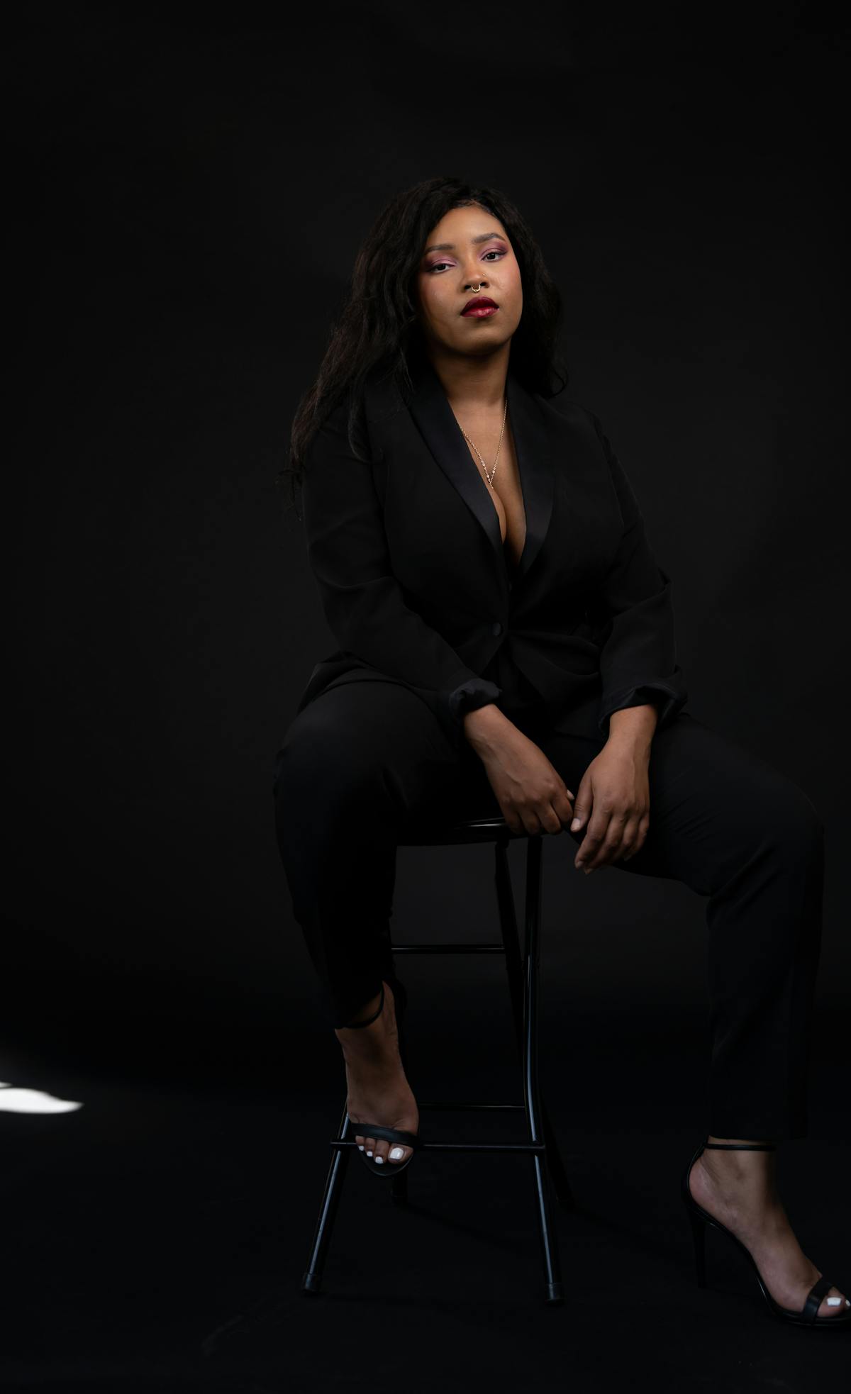 Women's Black Tuxedo on Female Founder of Healthy Roots Dolls, Yelitsa Jean-Charles