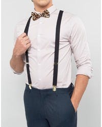 Suit pants and suspenders with cheetah print bow tie for homecoming.
