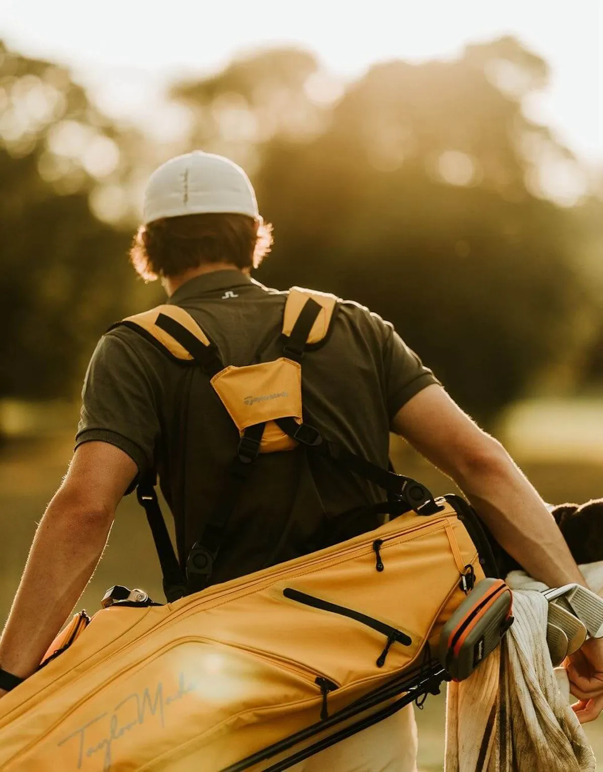 Golfer with golf bag