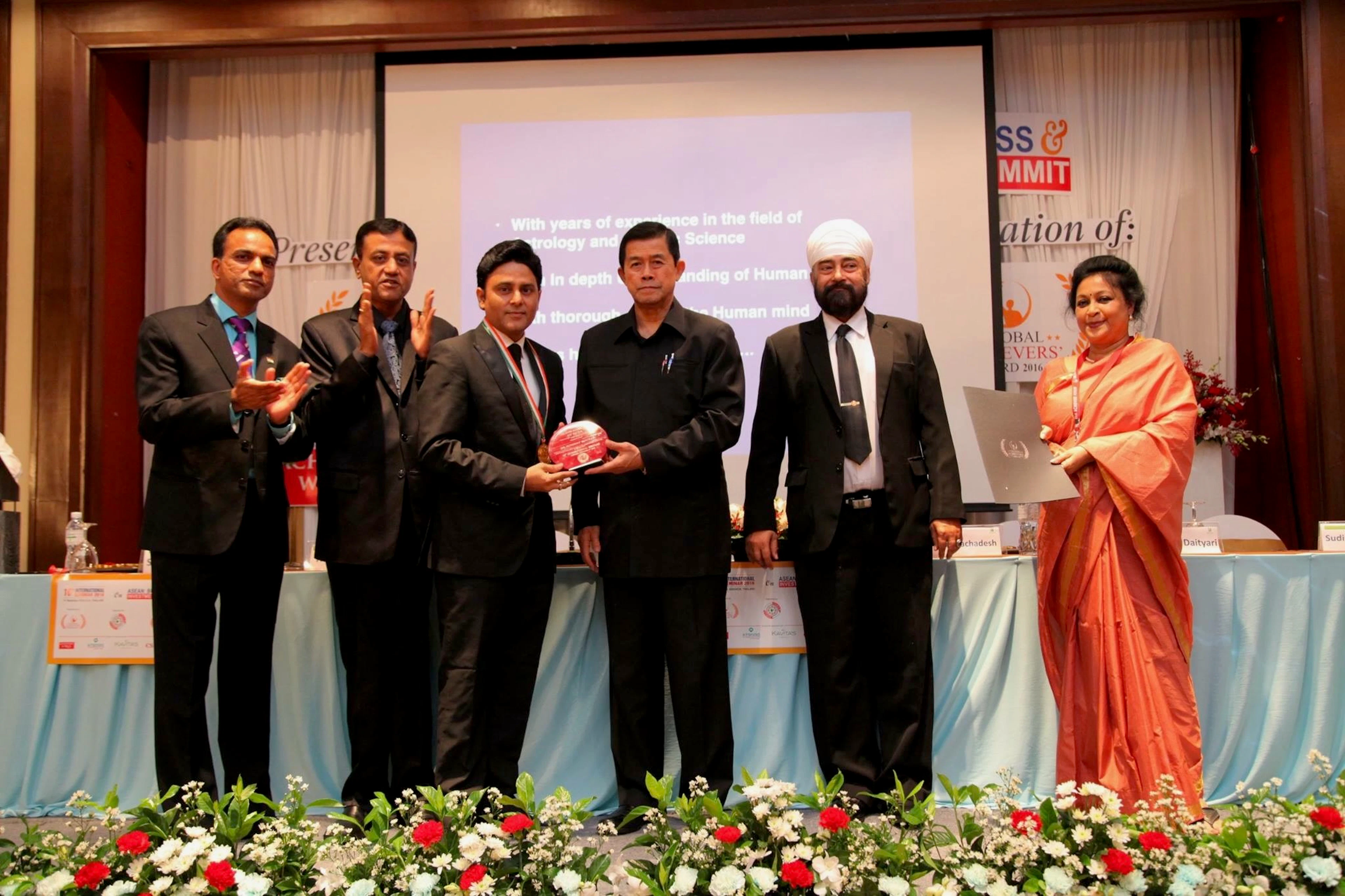 Sundeep Kochar receiving Nostradamus of India by deputy prime minister of Thailand