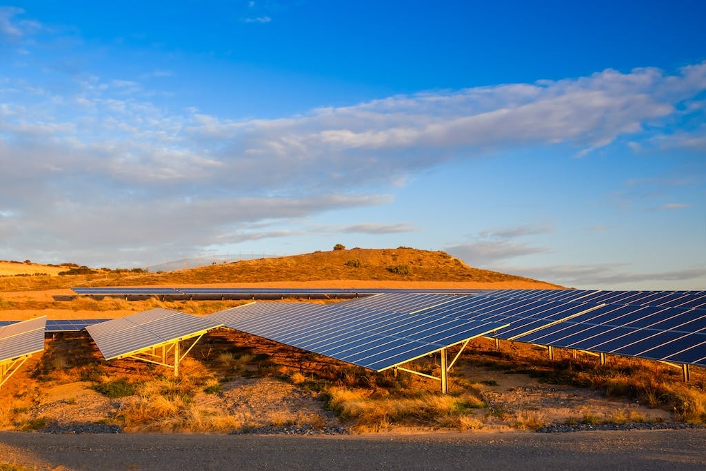 A solar farm in rural southern Australia, blue skies above it