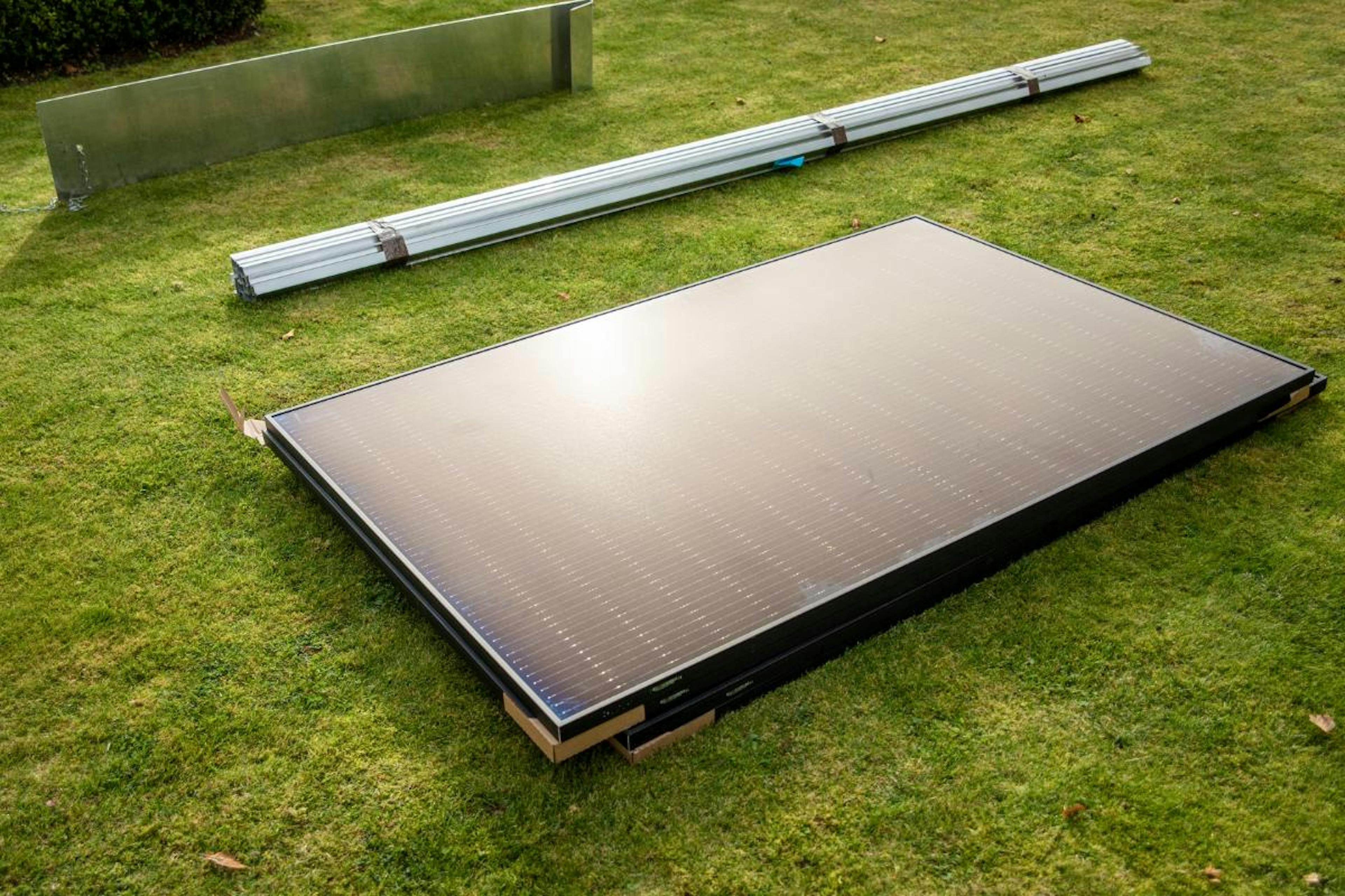 A photo of solar panels on the grass