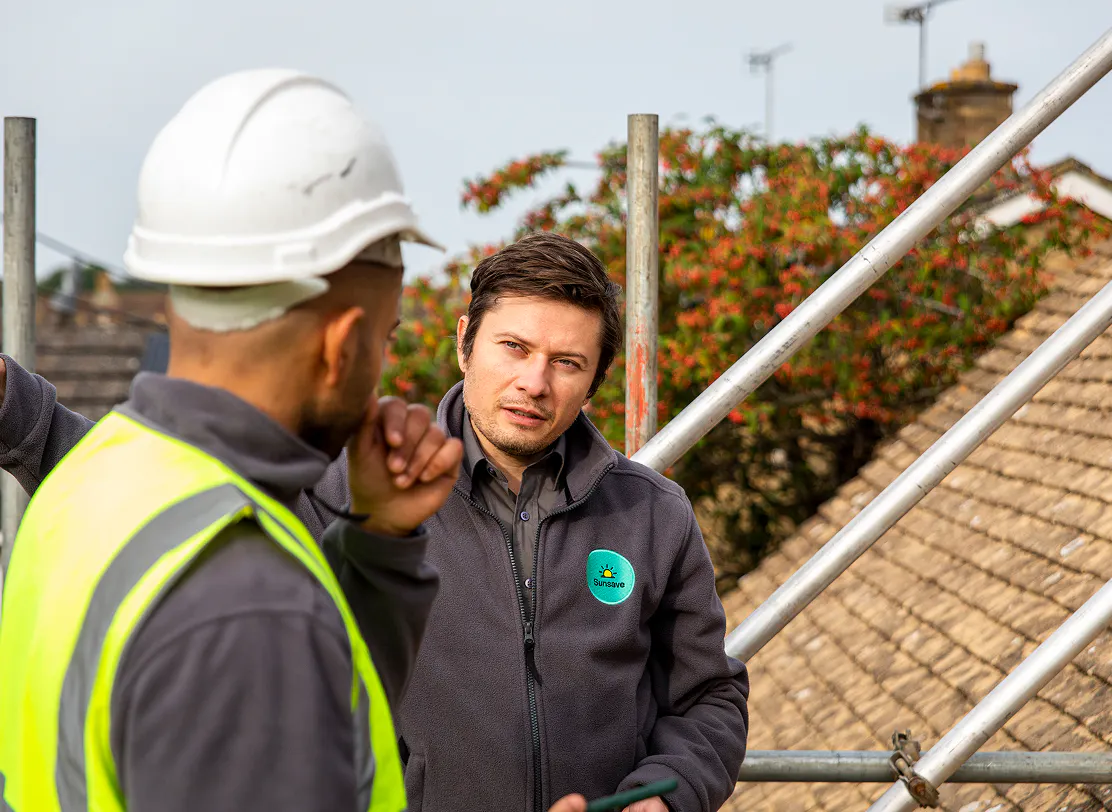 Photo of Sunsave installers on scaffolding