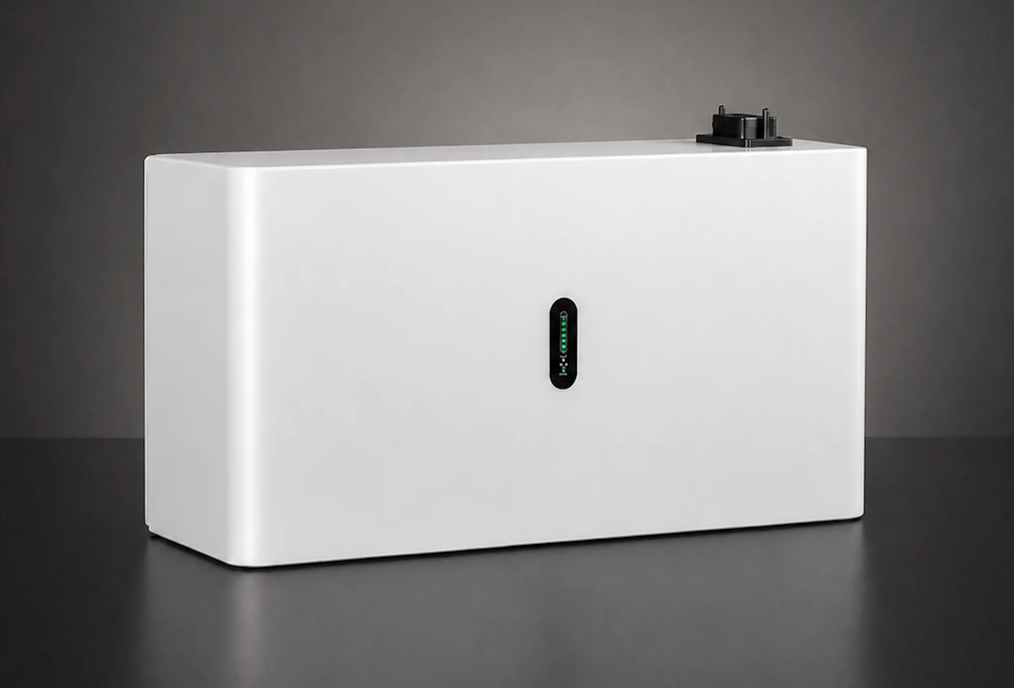 A white battery against a dark background