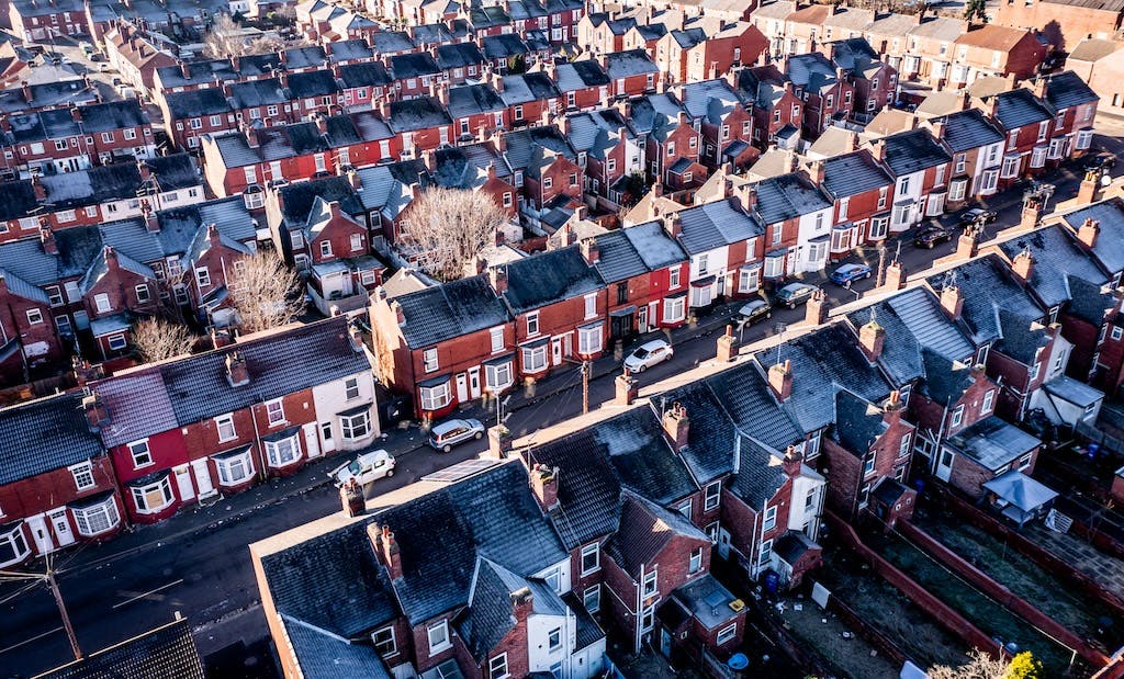 Aerial shot of terraced houses in the UK in winter