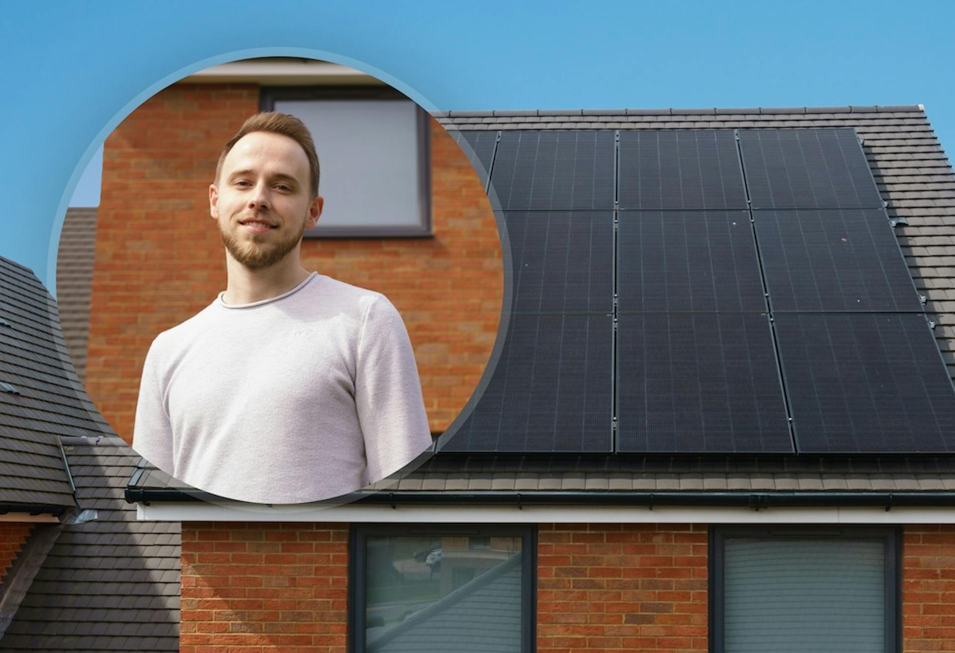 Circle including a smiling man in a white jumper, against a background of a house with black solar panels on its roof, blue sky in background