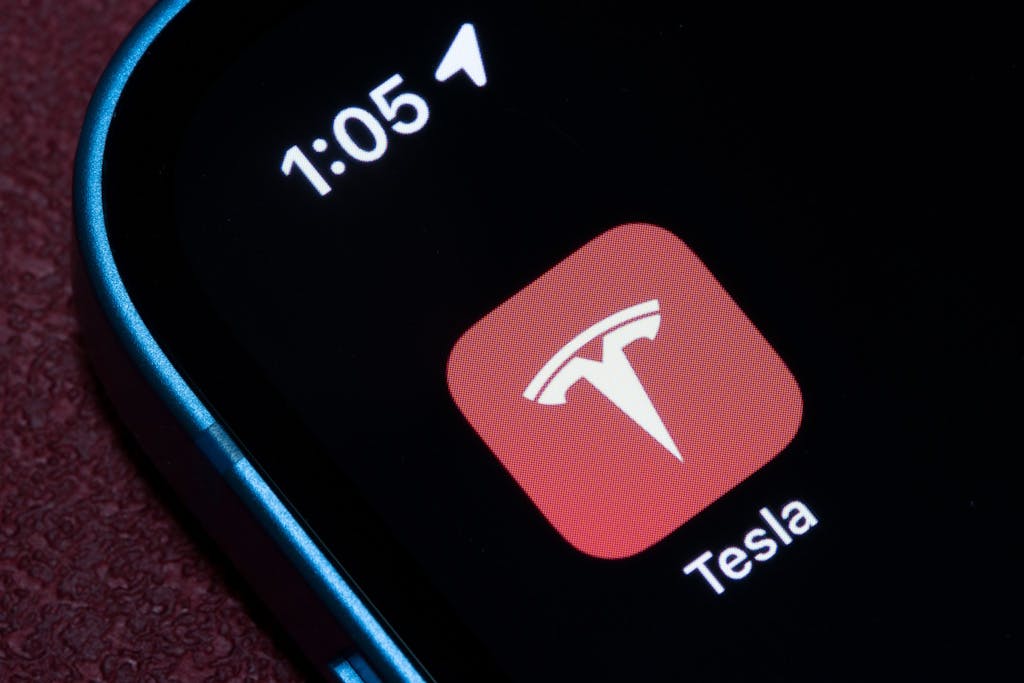 A Tesla app widget on a dark phone screen