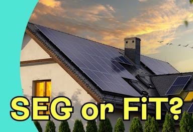 A photo of a house with the question 'SEG or FiT?' in yellow across it, against an aquamarine background