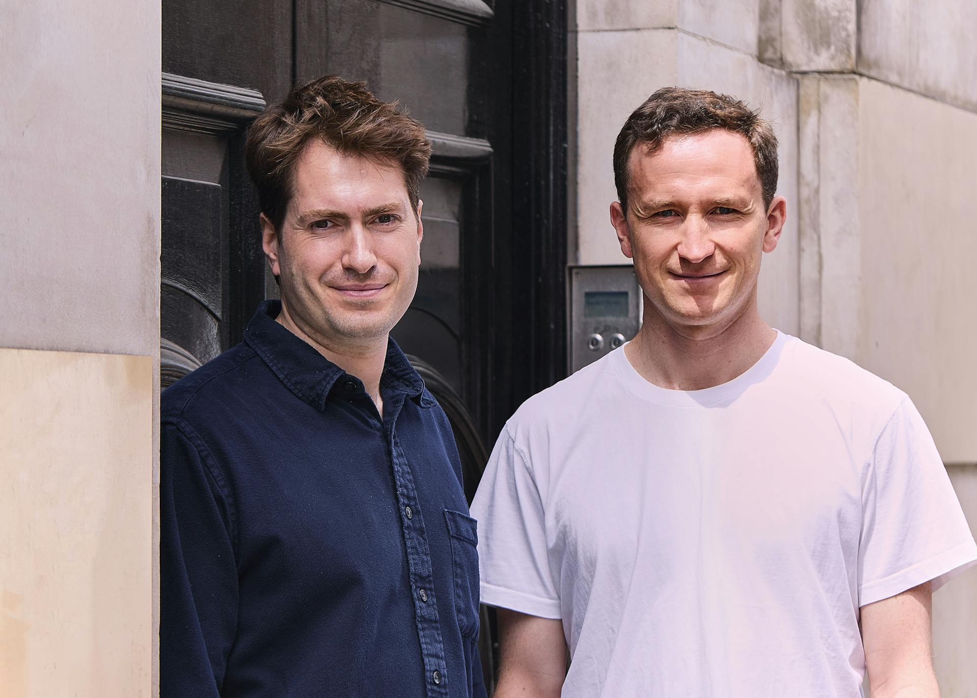 Sunsave co-founder Alick Dru and Ben Graves stood outside in Soho