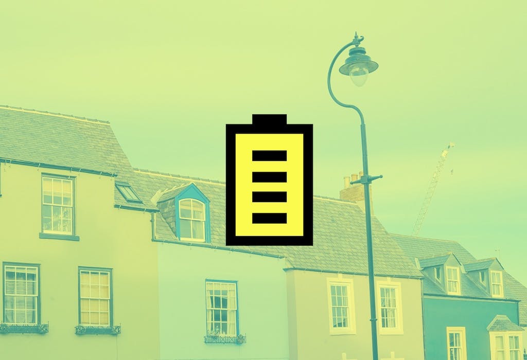A row of terraced houses in the UK, a yellow filter on top, and a cartoon yellow storage battery in the centre