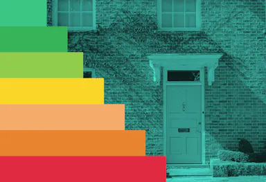 The front doorstep of a house with a colourful EPC grading scale in the left foreground