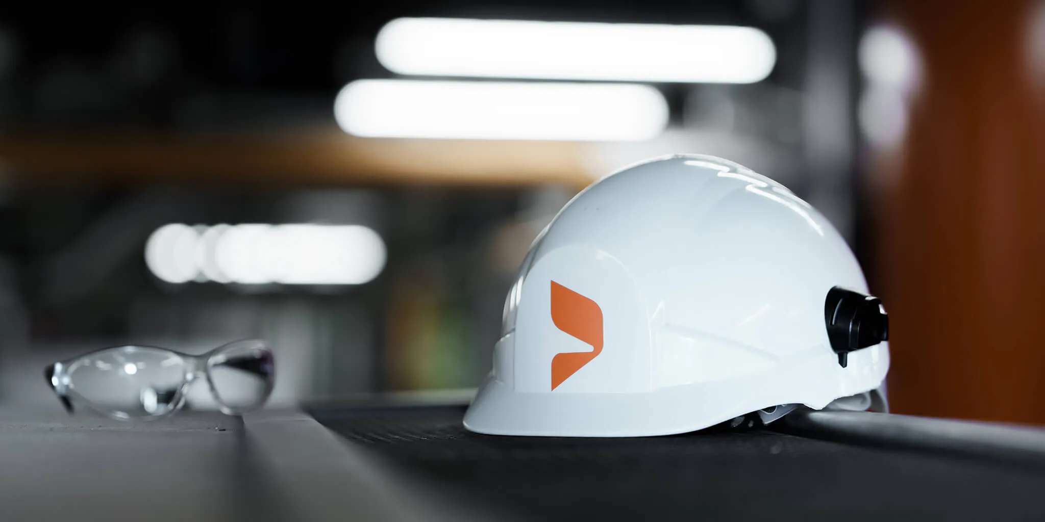 Close up of a branded hard hat