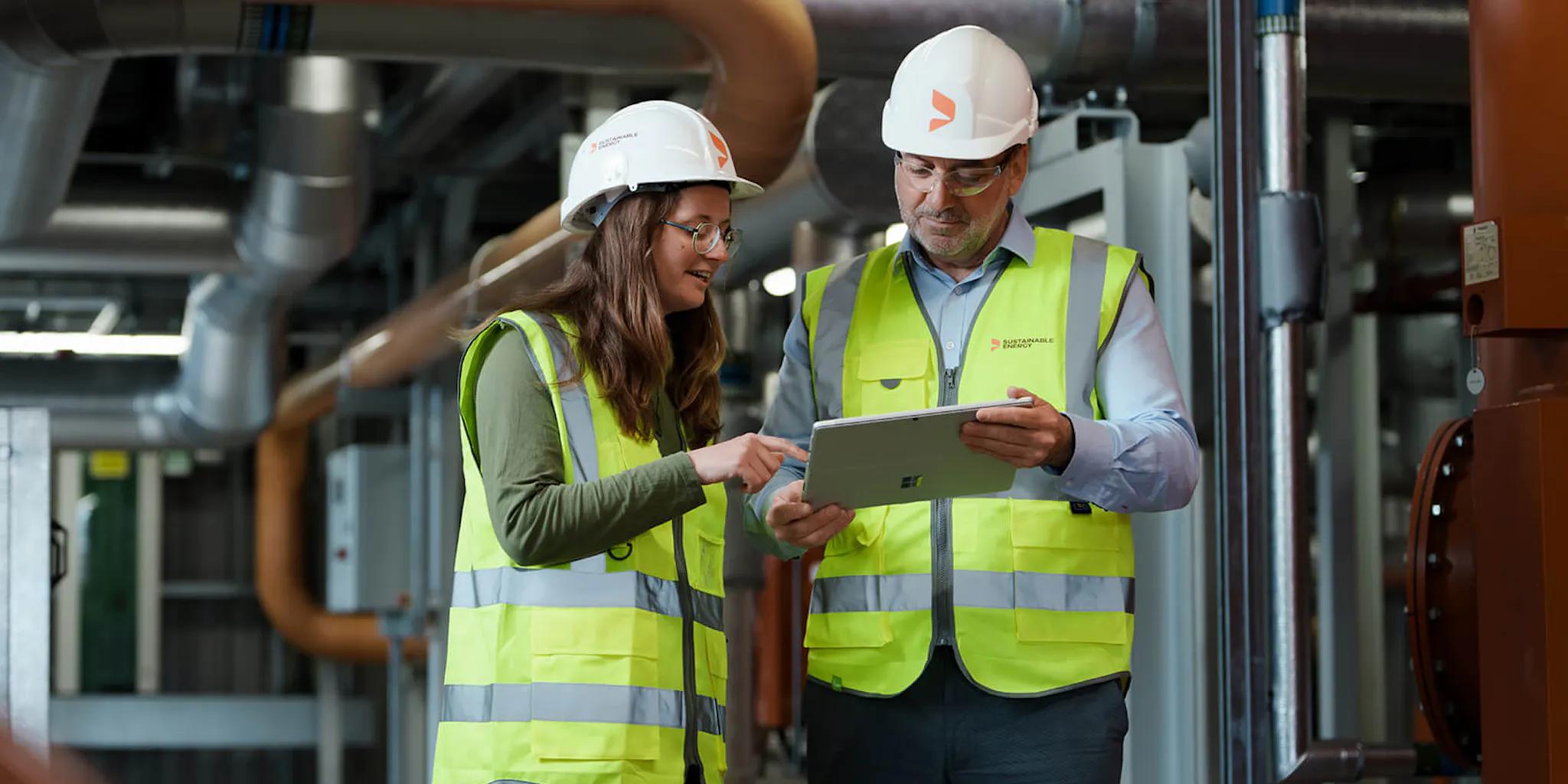 Engineers on site studying plans