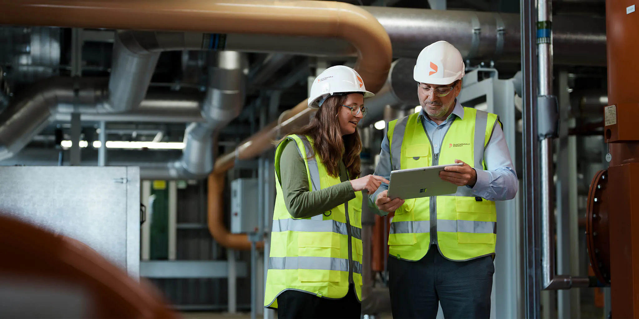 Engineers on site studying plans
