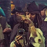 Jack Sparrow looking at his compass