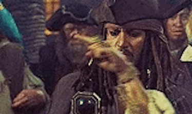 Jack Sparrow looking at his compass