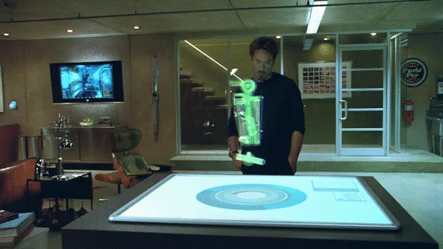 Tony Stark using a holographic arm