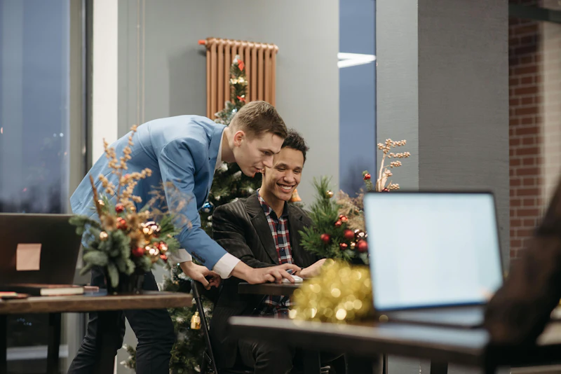 colleagues working together on a laptop