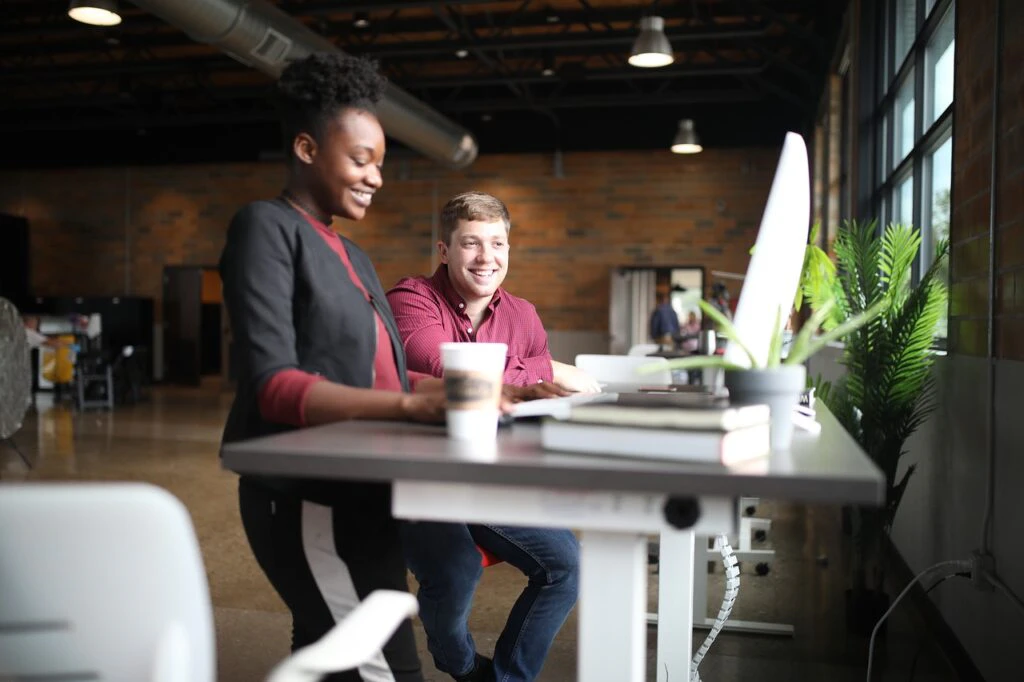 two colleagues working in a modern office