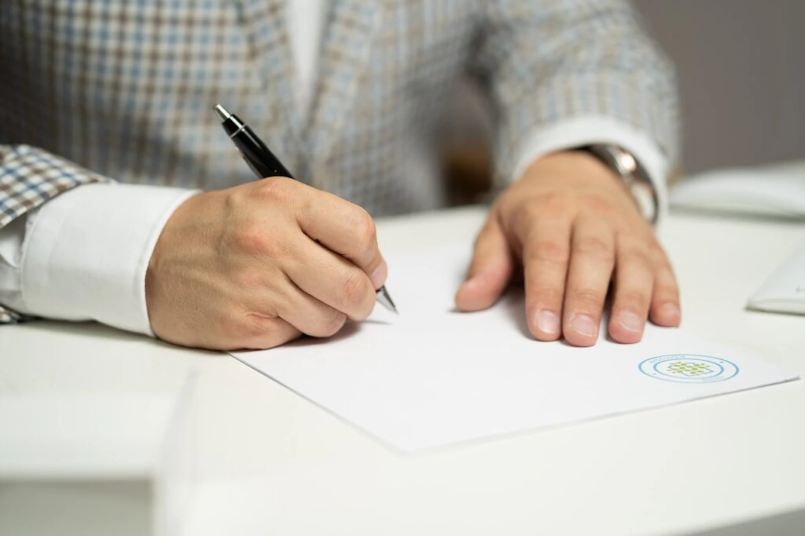 a person signing a contract