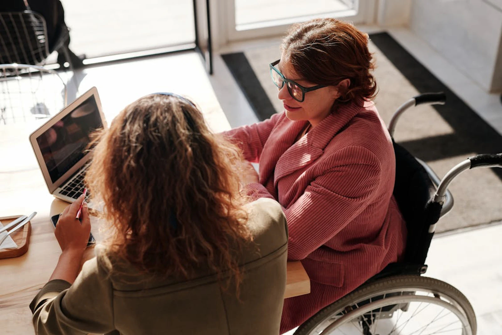two women having a meeting in an office