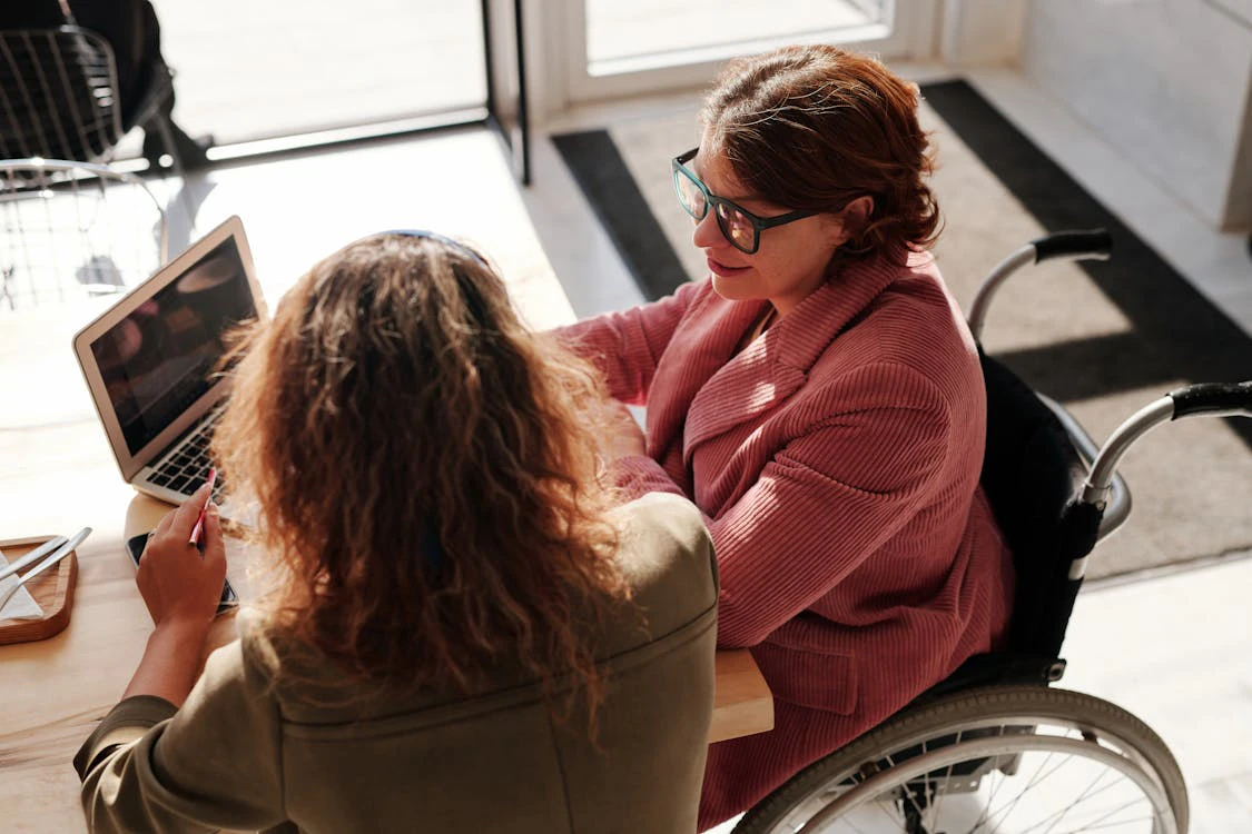 two women having a meeting in an office