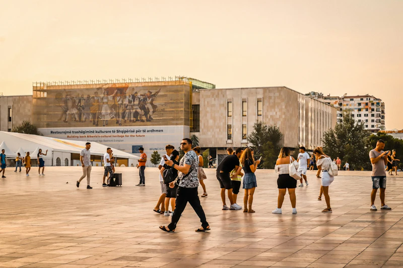 People walking on Albanian city square