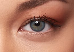 Dark brown eyes after wearing SWATI Sapphire - Sky Blue Coloured lenses